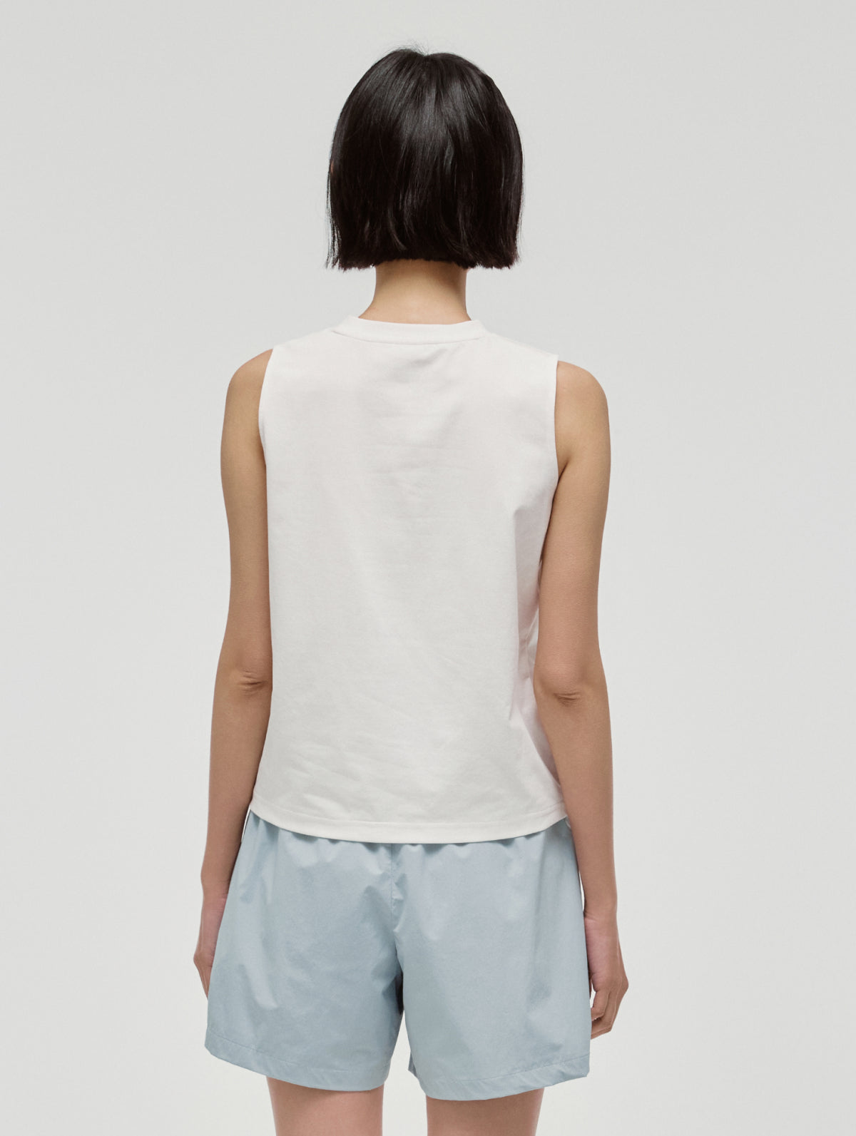 W'S ESSENTIAL AIRDRY SLEEVELESS - OFF WHITE