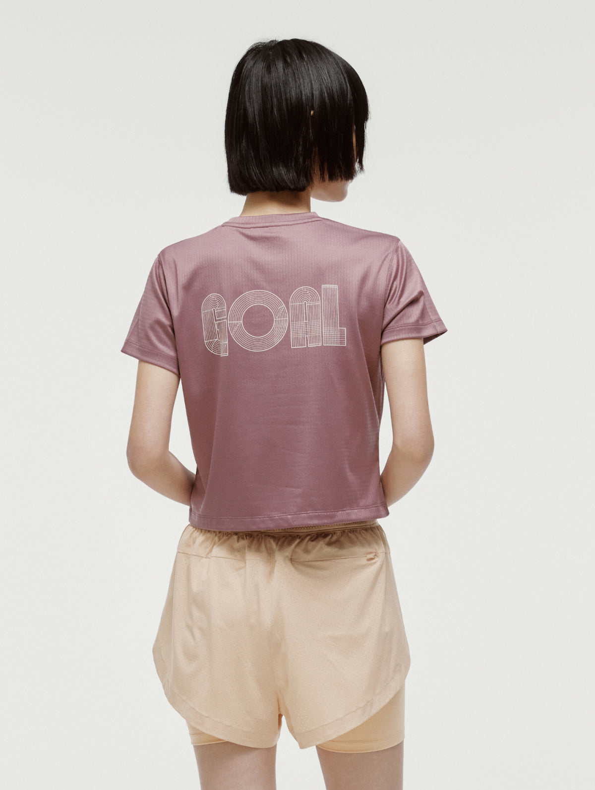 W'S TRACK GOAL LOGO CROP TEE - BRICK