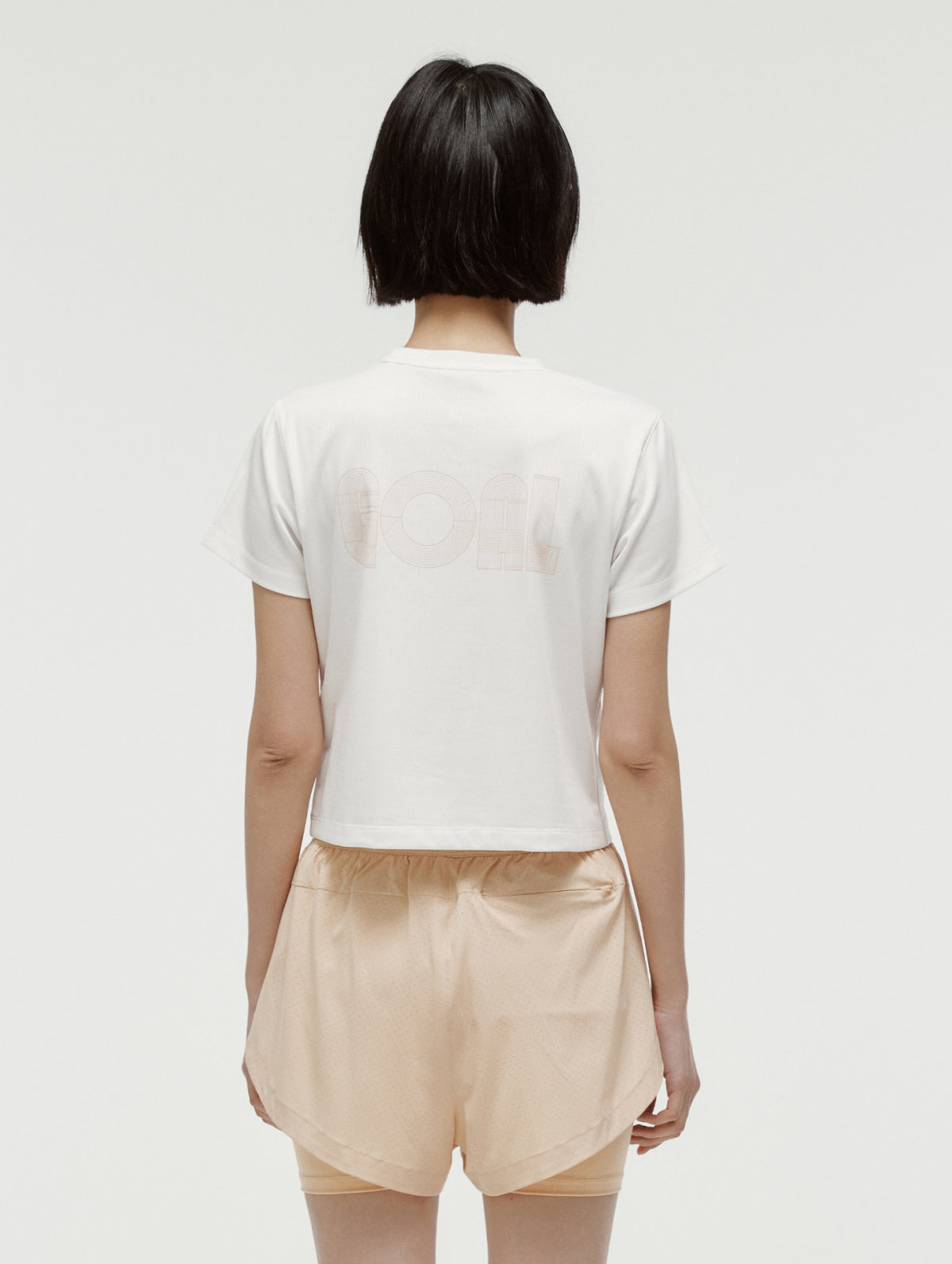 W'S TRACK GOAL LOGO CROP TEE - OFF WHITE