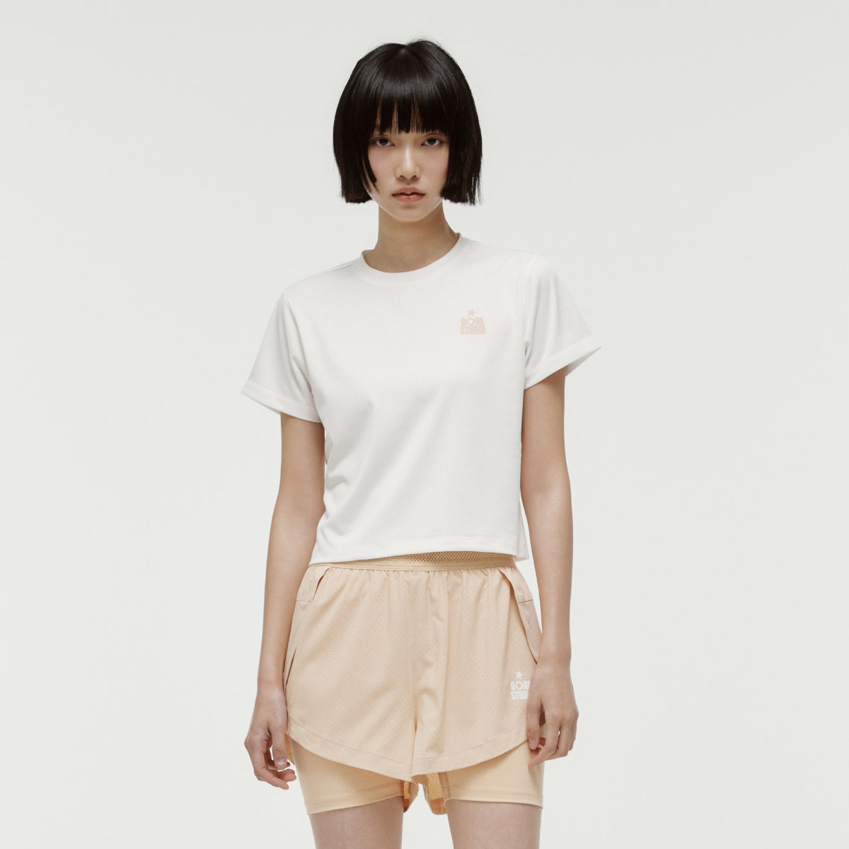 W'S TRACK GOAL LOGO CROP TEE - OFF WHITE