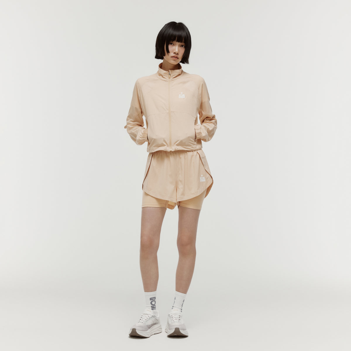 W'S PUNCHING LIGHT JACKET - SAND