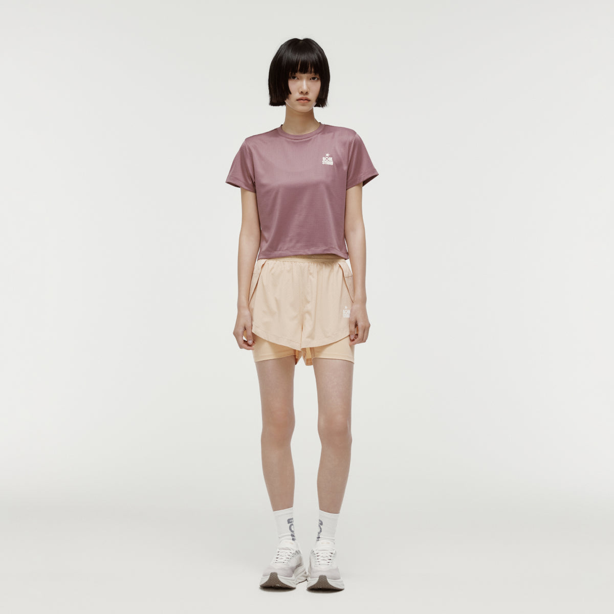 W'S TRACK GOAL LOGO CROP TEE - BRICK