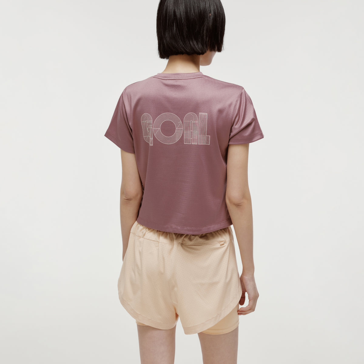 W'S TRACK GOAL LOGO CROP TEE - BRICK