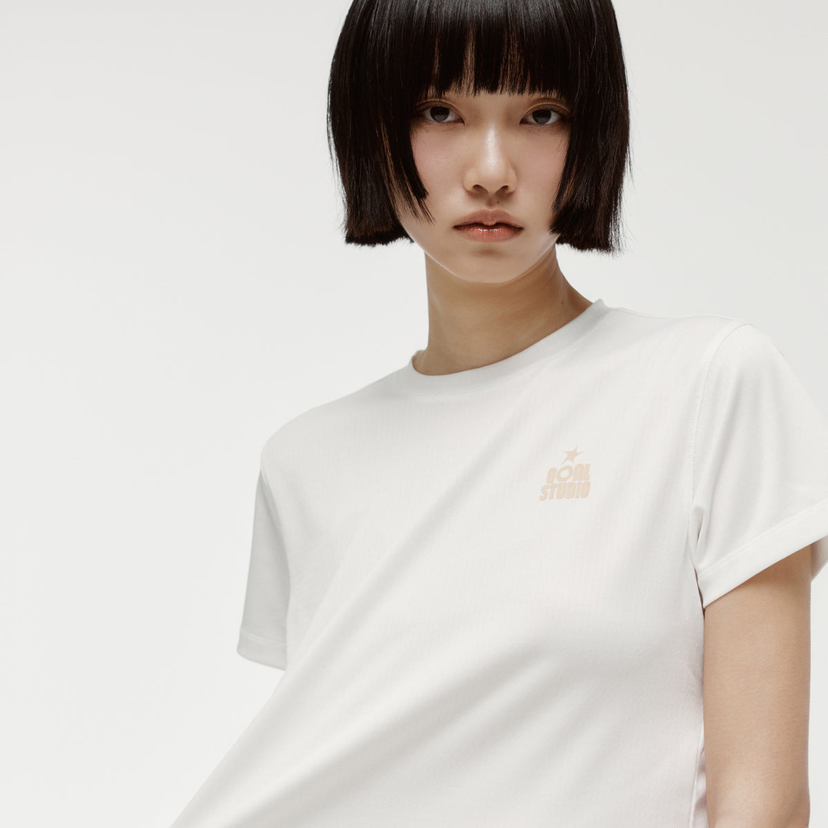 W'S TRACK GOAL LOGO CROP TEE - OFF WHITE
