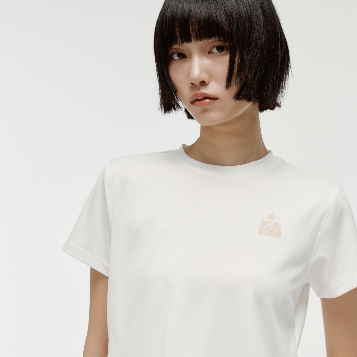 W'S TRACK GOAL LOGO CROP TEE - OFF WHITE