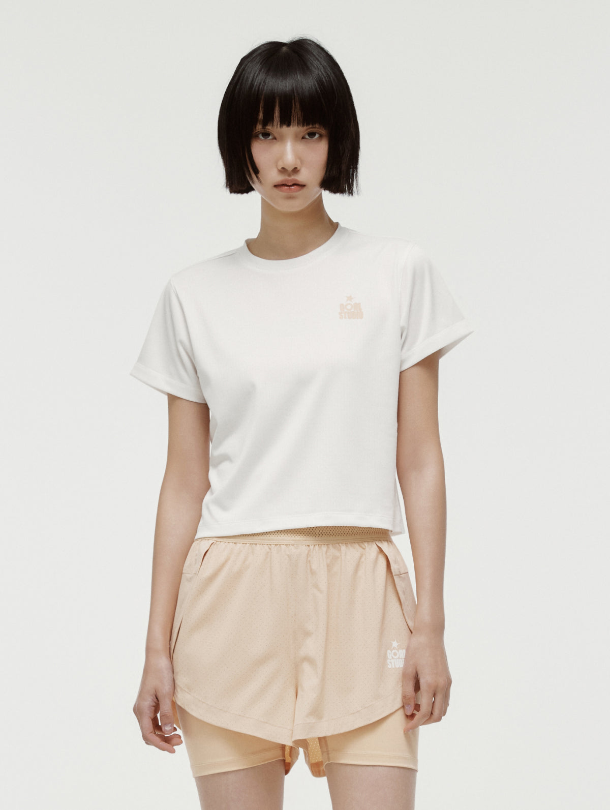W'S TRACK GOAL LOGO CROP TEE - OFF WHITE