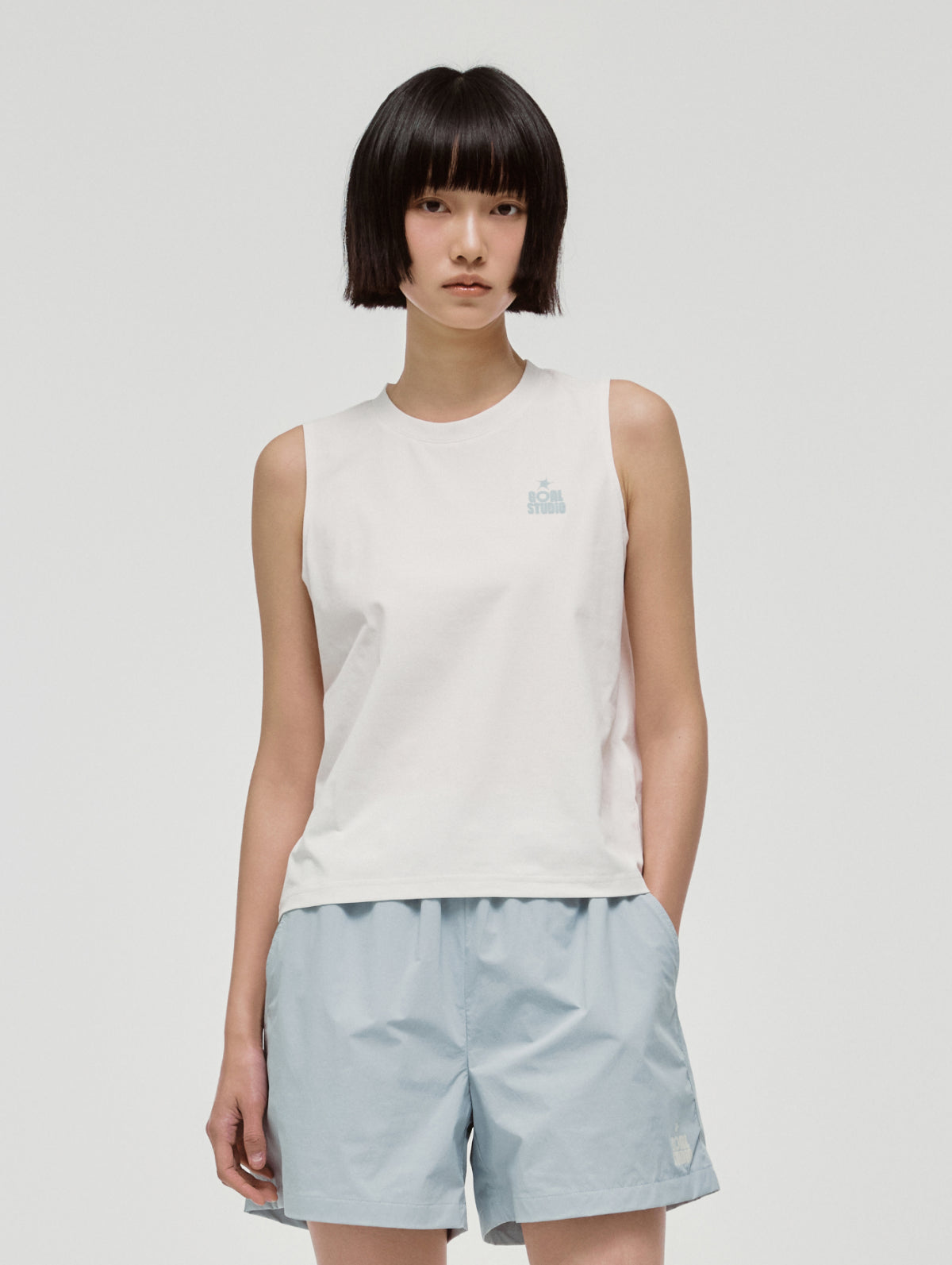 W'S ESSENTIAL AIRDRY SLEEVELESS - OFF WHITE