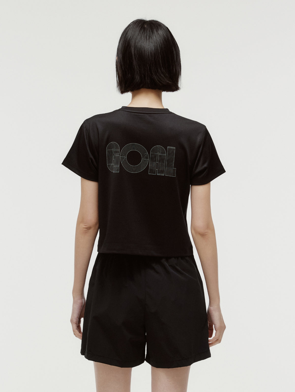 W'S TRACK GOAL LOGO CROP TEE - BLACK